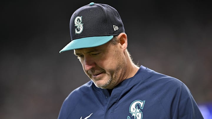 Jun 28, 2025; Arlington, Texas, USA; Seattle Mariners manager Dan Wilson (6) during the game between the Texas Rangers and the Seattle Mariners at Globe Life Field. Mandatory Credit: Jerome Miron-Imagn Images
