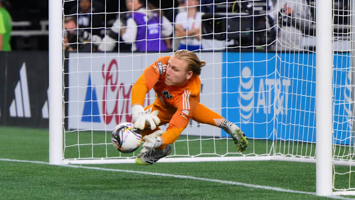 Aug 20, 2025; Seattle, Washington, USA; Seattle Sounders FC goalkeeper Andrew Thomas (26) blocks a goal shot during the shootout against Puebla at Lumen Field. Mandatory Credit: Steven Bisig-Imagn Images