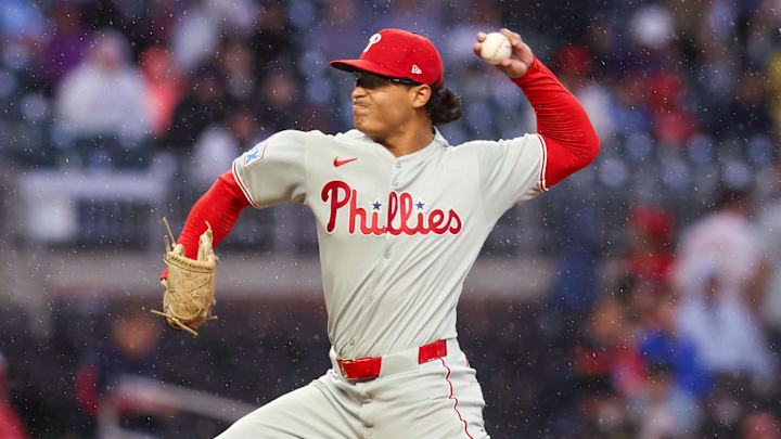 Apr 10, 2025; Atlanta, Georgia, USA; Philadelphia Phillies starting pitcher Jesus Luzardo (44) throws in a light rain against the Atlanta Braves in the second inning at Truist Park. 