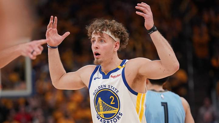 San Francisco, California, USA; Golden State Warriors guard Brandin Podziemski (2) reacts after the Warriors were called for a foul against the Memphis Grizzlies in the fourth quarter at the Chase Center. Mandatory Credit: Cary Edmondson-Imagn Images