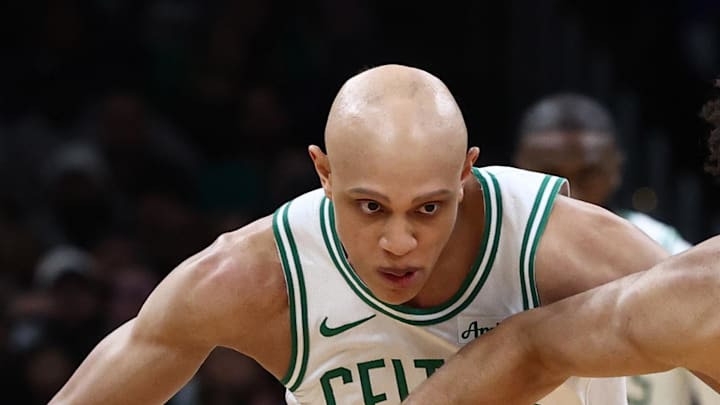 Dec 15, 2025; Boston, Massachusetts, USA; Detroit Pistons guard Cade Cunningham (2) and Boston Celtics guard Jordan Walsh (27) eye a loose ball during the second half at TD Garden. Mandatory Credit: Winslow Townson-Imagn Images