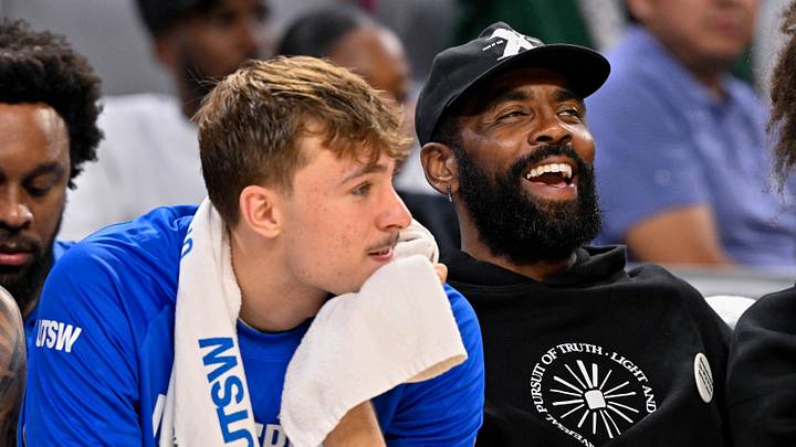 Oct 6, 2025; Fort Worth, Texas, USA; Dallas Mavericks forward Cooper Flagg (left) and guard Kyrie Irving (right) look on during the game between the Dallas Mavericks and the Oklahoma City Thunder at Dickie's Arena. Mandatory Credit: Jerome Miron-Imagn Images Oct 6, 2025; Fort Worth, Texas, USA; Dallas Mavericks forward Cooper Flagg (left) and guard Kyrie Irving (right) look on during the game between the Dallas Mavericks and the Oklahoma City Thunder at Dickie's Arena. Mandatory Credit: Jerome Miron-Imagn Images