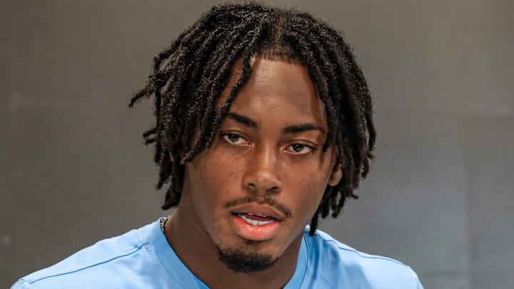 Linebacker Mikai Gbayor speaking at the podium after North Carolina's 41-6 victory over Richmond on Sept. 13, 2025. Linebacker Mikai Gbayor speaking at the podium after North Carolina's 41-6 victory over Richmond on Sept. 13, 2025.