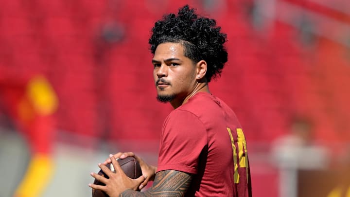 Sep 6, 2025; Los Angeles, California, USA;  USC Trojans quarterback Jayden Maiava (14) warms up prior to the game against the Georgia Southern Eagles at United Airlines Field at Los Angeles Memorial Coliseum. Mandatory Credit: Jayne Kamin-Oncea-Imagn Images