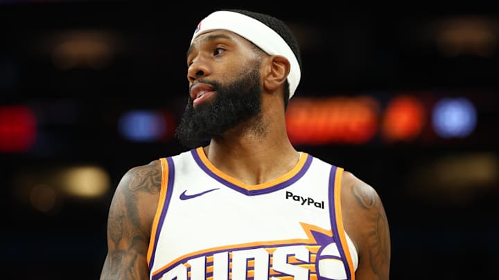 Feb 5, 2026; Phoenix, Arizona, USA; Phoenix Suns forward Royce O'Neale (00) against the Golden State Warriors at Mortgage Matchup Center. Mandatory Credit: Mark J. Rebilas-Imagn Images