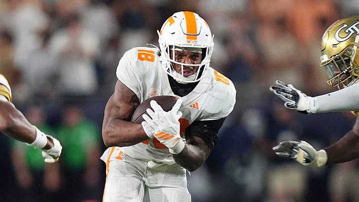 Tennessee running back DeSean Bishop (18) runs the ball while defended by Georgia Tech during a college football game between Tennessee and Georgia Tech at Bobby Dodd Stadium in Atlanta, Ga., on Sept. 12, 2026.