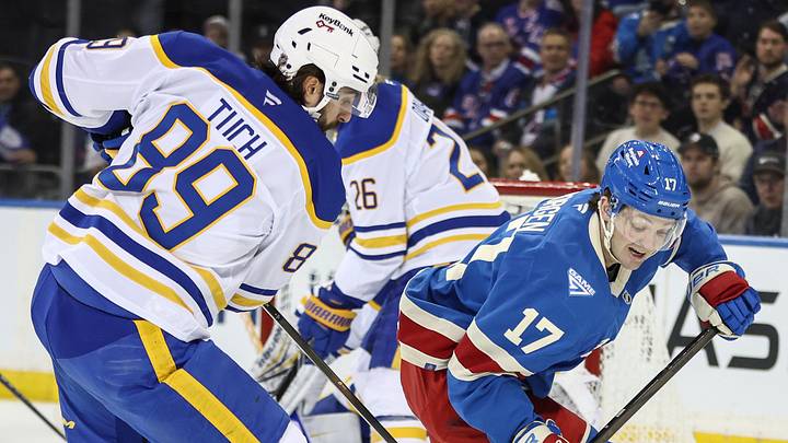 Jan 8, 2026; New York, New York, USA; Buffalo Sabres right wing Alex Tuch (89) and New York Rangers defenseman Will Borgen (17) battle for control of the puck in the first period at Madison Square Garden. Jan 8, 2026; New York, New York, USA; Buffalo Sabres right wing Alex Tuch (89) and New York Rangers defenseman Will Borgen (17) battle for control of the puck in the first period at Madison Square Garden.