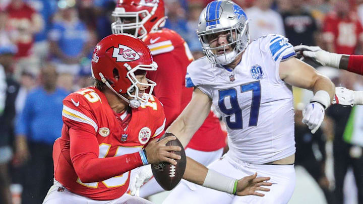 Detroit Lions defensive end Aidan Hutchinson (97) looks to tackle Kansas City Chiefs quarterback Patrick Mahomes (15) during the second half at Arrowhead Stadium in Kansas City, Mo. on Thursday, Sept. 7, 2023.