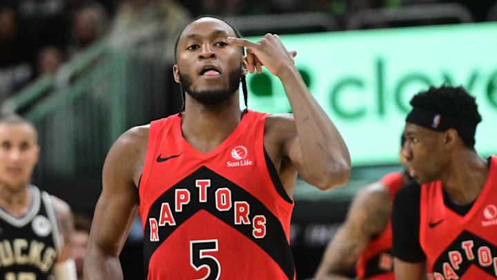 Feb 22, 2026; Milwaukee, Wisconsin, USA; Toronto Raptors guard Immanuel Quickley (5) reacts after scoring a 3-point basket against the Milwaukee Bucks in the third quarter at Fiserv Forum. Mandatory Credit: Benny Sieu-Imagn Images