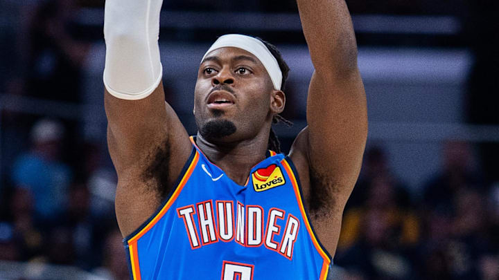 Oct 23, 2025; Indianapolis, Indiana, USA; Oklahoma City Thunder guard Luguentz Dort (5) shoots the ball in the first half against the Indiana Pacers at Gainbridge Fieldhouse. Mandatory Credit: Trevor Ruszkowski-Imagn Images Oct 23, 2025; Indianapolis, Indiana, USA; Oklahoma City Thunder guard Luguentz Dort (5) shoots the ball in the first half against the Indiana Pacers at Gainbridge Fieldhouse. Mandatory Credit: Trevor Ruszkowski-Imagn Images
