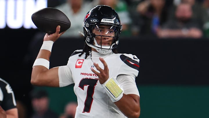 Oct 31, 2024; East Rutherford, New Jersey, USA; Houston Texans quarterback C.J. Stroud (7) throws a pass against the New York Jets during the first half at MetLife Stadium. Mandatory Credit: Ed Mulholland-Imagn Images