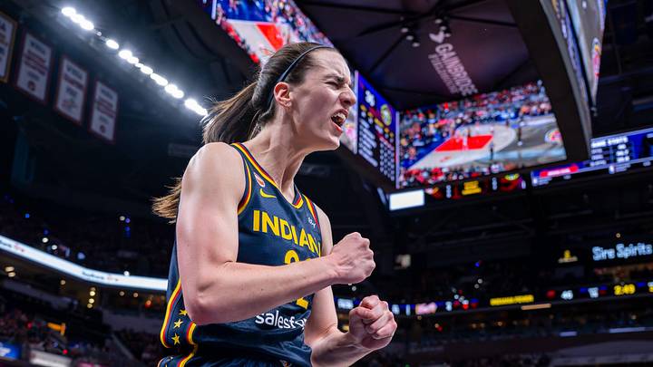 Caitlin Clark celebrates after a huge and-one against Storm.