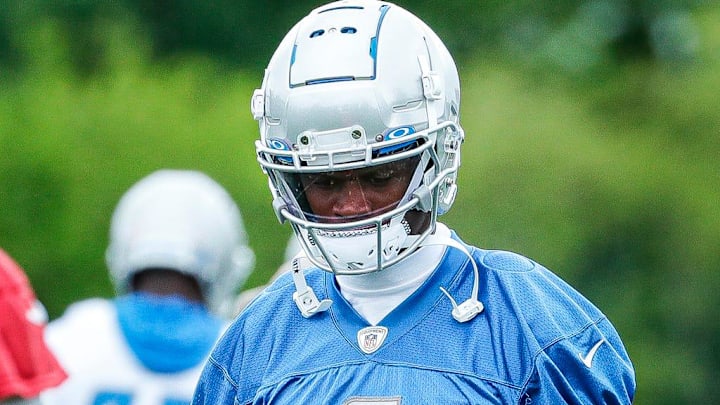 Former Detroit Lions wide receiver DJ Chark (4) warms up during mini camp at the practice facility in Allen Park on Tuesday, June 7, 2022.
