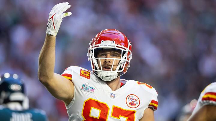 Feb 12, 2023; Glendale, Arizona, US; Kansas City Chiefs tight end Travis Kelce (87) celebrates a touchdown against the Philadelphia Eagles during the first quarter of Super Bowl LVII at State Farm Stadium. Mandatory Credit: Mark J. Rebilas-Imagn Images