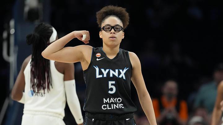 May 27, 2026; Minneapolis, Minnesota, USA; Minnesota Lynx guard Olivia Miles (5) flexes after making a shot against the Atlanta Dream in the first half at Target Center. Mandatory Credit: Jesse Johnson-Imagn Images