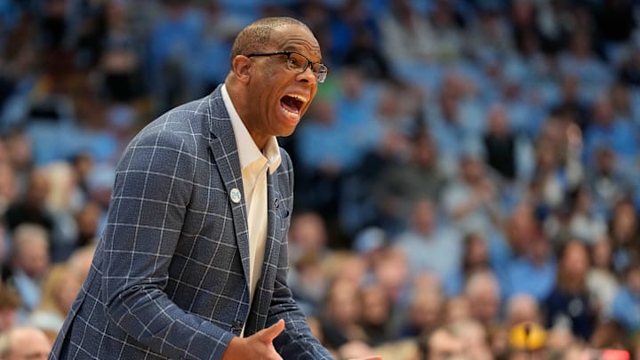 Dec 14, 2024; Chapel Hill, North Carolina, USA; North Carolina Tar Heels head coach Hubert Davis reacts in the second half at Dean E. Smith Center. Mandatory Credit: Bob Donnan-Imagn Images Dec 14, 2024; Chapel Hill, North Carolina, USA; North Carolina Tar Heels head coach Hubert Davis reacts in the second half at Dean E. Smith Center. Mandatory Credit: Bob Donnan-Imagn Images