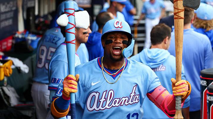 Aug 15, 2026; Cumberland, Georgia, USA; Atlanta Braves right fielder Ronald Acuña Jr. (13) reacts in the dugout after hitting a solo home run against the Arizona Diamondbacks in the first inning at Truist Park. Mandatory Credit: Colin Hubbard-Imagn Images