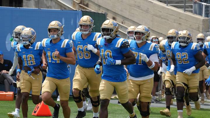 May 2, 2026; Pasadena, CA, USA; UCLA Bruins players enter the field during the spring game at Rose Bowl. Mandatory Credit: Kirby Lee-Imagn Images