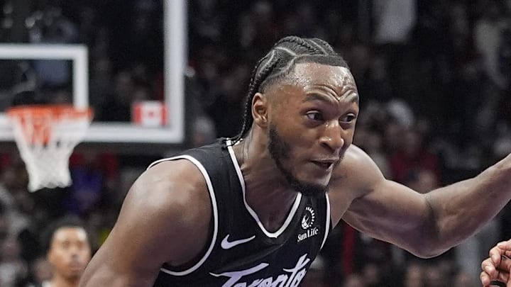 Toronto Raptors guard Immanuel Quickley drives to the basket against San Antonio Spurs center Victor Wembanyama. Toronto Raptors guard Immanuel Quickley drives to the basket against San Antonio Spurs center Victor Wembanyama.