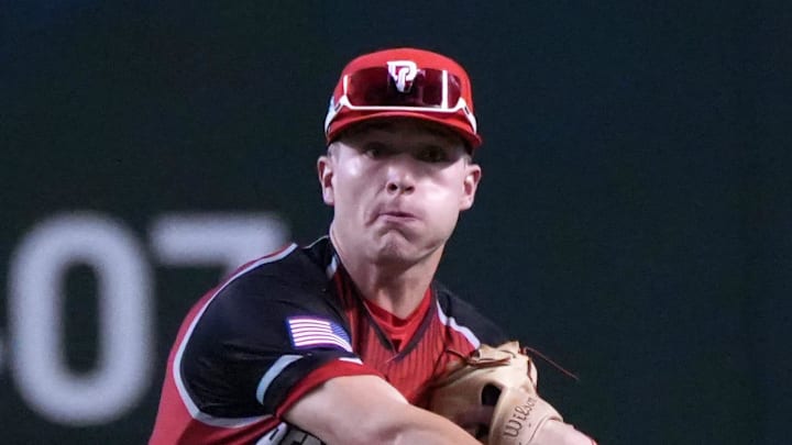 West Squad's Kevin McGonigle throws the ball in to first base during the Perfect Game All-American Classic at Chase Field on Sunday, Aug. 28, 2022.