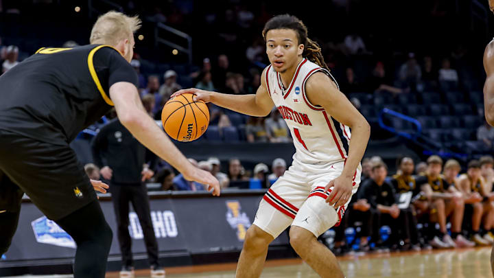 Houston Cougars guard Kingston Flemings dribbles the ball during a first round game of the men's 2026 NCAA Tournament. Houston Cougars guard Kingston Flemings dribbles the ball during a first round game of the men's 2026 NCAA Tournament.