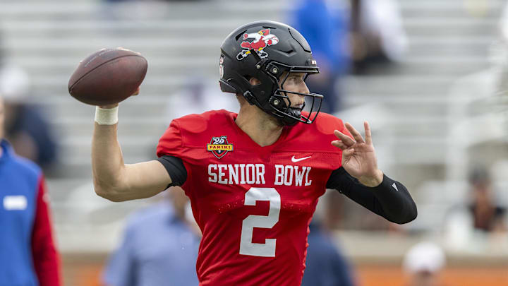 Jan 30, 2025; Mobile, AL, USA; National team quarterback Tyler Shough of Louisville (2) works through drills during Senior Bowl practice for the National team at Hancock Whitney Stadium. Mandatory Credit: Vasha Hunt-Imagn Images