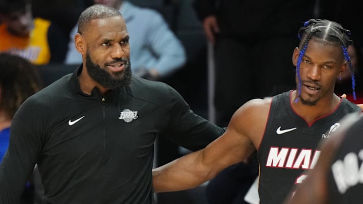 Dec 4, 2024; Miami, Florida, USA; Los Angeles Lakers forward LeBron James (23) and Miami Heat forward Jimmy Butler (22) greet each other following the game at the Kaseya Center. Mandatory Credit: Jim Rassol-Imagn Images Dec 4, 2024; Miami, Florida, USA; Los Angeles Lakers forward LeBron James (23) and Miami Heat forward Jimmy Butler (22) greet each other following the game at the Kaseya Center. Mandatory Credit: Jim Rassol-Imagn Images