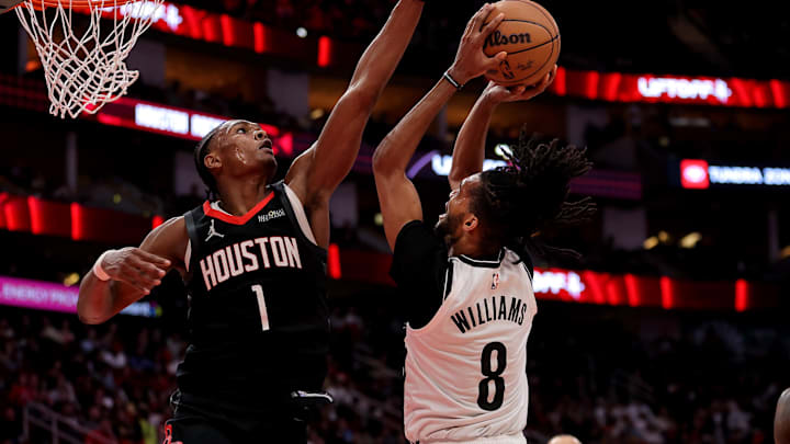 Feb 1, 2025; Houston, Texas, USA; Houston Rockets guard Amen Thompson (1) defends a shot by Brooklyn Nets forward Ziaire Williams (8) during the third quarter at Toyota Center. Mandatory Credit: Erik Williams-Imagn Images Feb 1, 2025; Houston, Texas, USA; Houston Rockets guard Amen Thompson (1) defends a shot by Brooklyn Nets forward Ziaire Williams (8) during the third quarter at Toyota Center. Mandatory Credit: Erik Williams-Imagn Images