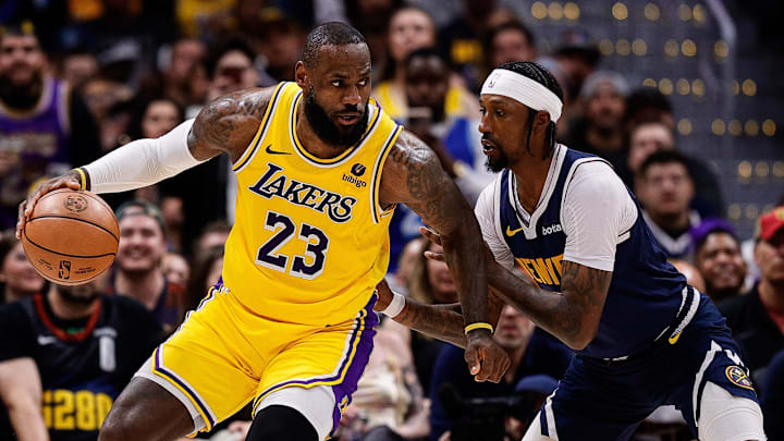 Apr 29, 2024; Denver, Colorado, USA; Los Angeles Lakers forward LeBron James (23) controls the ball as Denver Nuggets guard Kentavious Caldwell-Pope (5) guards in the third quarter during game five of the first round for the 2024 NBA playoffs at Ball Arena. Mandatory Credit: Isaiah J. Downing-Imagn Images Apr 29, 2024; Denver, Colorado, USA; Los Angeles Lakers forward LeBron James (23) controls the ball as Denver Nuggets guard Kentavious Caldwell-Pope (5) guards in the third quarter during game five of the first round for the 2024 NBA playoffs at Ball Arena. Mandatory Credit: Isaiah J. Downing-Imagn Images