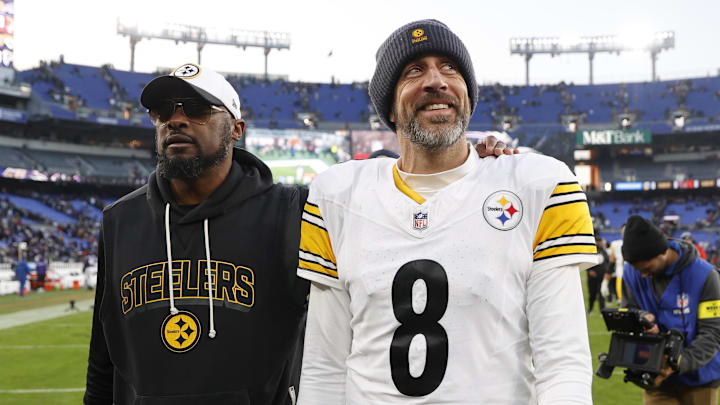 Dec 7, 2025; Baltimore, Maryland, USA; Pittsburgh Steelers head coach Mike Tomlin and quarterback Aaron Rodgers (8) walk off the field after the game against the Baltimore Ravens at M&T Bank Stadium. Mandatory Credit: Peter Casey-Imagn Images