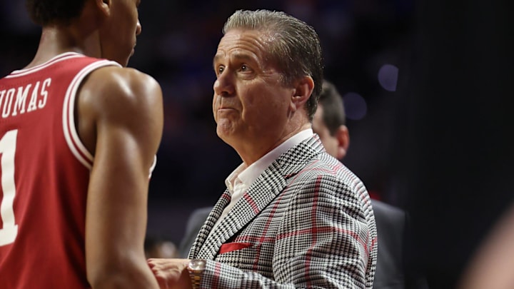 Arkansas Razorbacks coach John Calipari talks with win Meleek Thomas during game against the Florida Gators at Steven C. O'Connell Center Exactek arena in Gainesville, Fla.
