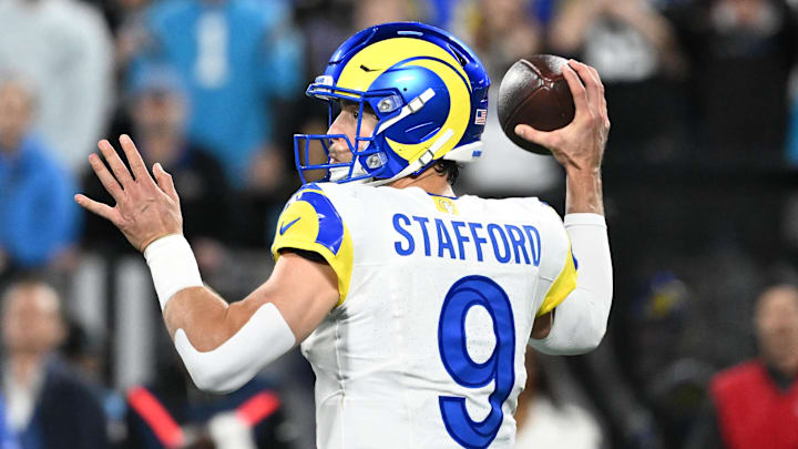 Jan 10, 2026; Charlotte, NC, USA; Los Angeles Rams quarterback Matthew Stafford (9) passes the ball in the fourth quarter in an NFC Wild Card Round game at Bank of America Stadium. Mandatory Credit: Bob Donnan-Imagn Images