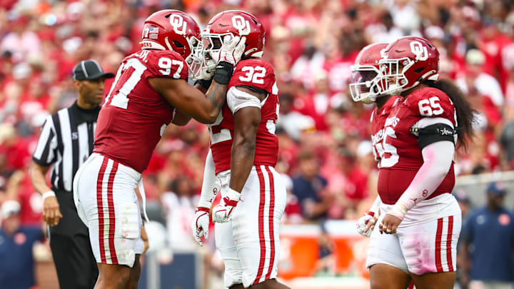 Defensive end Marvin Jones Jr. (97) celebrates with R Mason Thomas (32) in Oklahoma's win over Auburn. Defensive end Marvin Jones Jr. (97) celebrates with R Mason Thomas (32) in Oklahoma's win over Auburn.