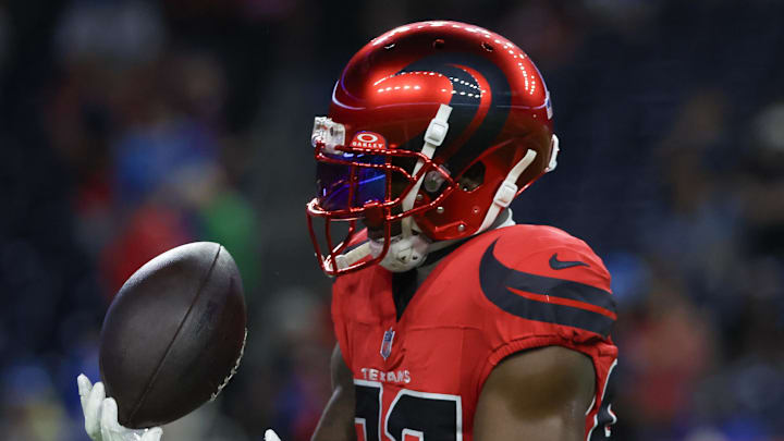 Nov 10, 2024; Houston, Texas, USA;Houston Texans wide receiver Steven Sims (82) warms up before play g against the Detroit Lions at NRG Stadium. Mandatory Credit: Thomas B. Shea-Imagn Images Nov 10, 2024; Houston, Texas, USA;Houston Texans wide receiver Steven Sims (82) warms up before play g against the Detroit Lions at NRG Stadium. Mandatory Credit: Thomas B. Shea-Imagn Images
