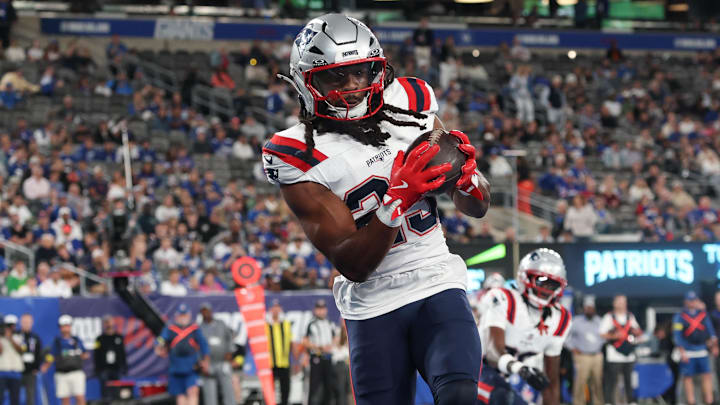 Aug 21, 2025; East Rutherford, New Jersey, USA; New England Patriots safety Kyle Dugger (23) interception a pass in the end zone during the first half against the New York Giants at MetLife Stadium. Mandatory Credit: Vincent Carchietta-Imagn Images