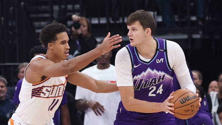 Oct 27, 2025; Salt Lake City, Utah, USA; Utah Jazz center Walker Kessler (24) looks to pass against Phoenix Suns forward Oso Ighodaro (11) during the first quarter at Delta Center. Mandatory Credit: Rob Gray-Imagn Images Oct 27, 2025; Salt Lake City, Utah, USA; Utah Jazz center Walker Kessler (24) looks to pass against Phoenix Suns forward Oso Ighodaro (11) during the first quarter at Delta Center. Mandatory Credit: Rob Gray-Imagn Images