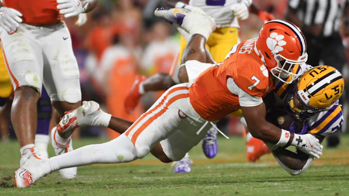 Clemson safety Khalil Barnes went viral after cameras caught his reaction to a heated sideline exchange with Dabo Swinney.