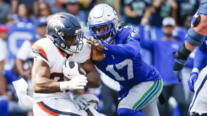 Sep 8, 2024; Seattle, Washington, USA; Seattle Seahawks defensive end Leonard Williams (99) and linebacker Jerome Baker (17) tackle Denver Broncos running back
Audric Estime (23) for a loss during the third quarter at Lumen Field. Mandatory Credit: Joe Nicholson-Imagn Images Sep 8, 2024; Seattle, Washington, USA; Seattle Seahawks defensive end Leonard Williams (99) and linebacker Jerome Baker (17) tackle Denver Broncos running back
Audric Estime (23) for a loss during the third quarter at Lumen Field. Mandatory Credit: Joe Nicholson-Imagn Images