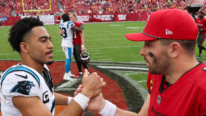 Tampa Bay Buccaneers quarterback Baker Mayfield greet Carolina Panthers quarterback Bryce Young. Tampa Bay Buccaneers quarterback Baker Mayfield greet Carolina Panthers quarterback Bryce Young.