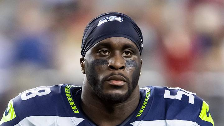 Seattle Seahawks linebacker Derick Hall walks off the field Seattle Seahawks linebacker Derick Hall walks off the field