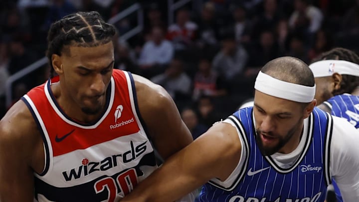 Washington Wizards center Alex Sarr and Orlando Magic guard Jalen Suggs.