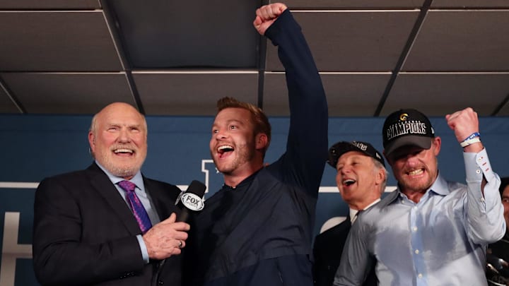 Jan 20, 2019; New Orleans, LA, USA; Los Angeles Rams head coach Sean McVay celebrates in the locker room with general manager Les Snead while interview by Fox sports reporter Terry Bradshaw after a victory in the NFC Championship game against the New Orleans Saints at Mercedes-Benz Superdome. Mandatory Credit: Matthew Emmons-Imagn Images Jan 20, 2019; New Orleans, LA, USA; Los Angeles Rams head coach Sean McVay celebrates in the locker room with general manager Les Snead while interview by Fox sports reporter Terry Bradshaw after a victory in the NFC Championship game against the New Orleans Saints at Mercedes-Benz Superdome. Mandatory Credit: Matthew Emmons-Imagn Images