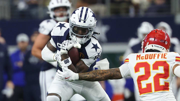Dallas Cowboys wide receiver CeeDee Lamb carries the ball against Kansas City Chiefs cornerback Trent McDuffie Dallas Cowboys wide receiver CeeDee Lamb carries the ball against Kansas City Chiefs cornerback Trent McDuffie