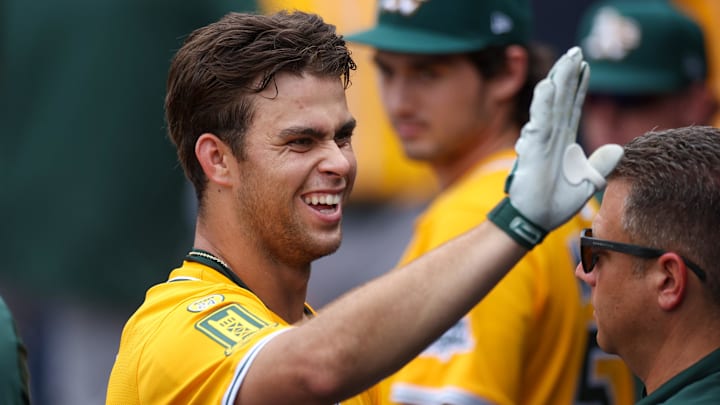 Jul 2, 2025; Tampa, Florida, USA; Athletics third baseman Max Muncy (10) reacts after hitting a home run against the Tampa Bay Rays in the ninth inning at George M. Steinbrenner Field. Mandatory Credit: Nathan Ray Seebeck-Imagn Images