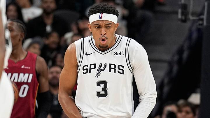 Nov 12, 2023; San Antonio, Texas, USA; San Antonio Spurs forward Keldon Johnson (3) reacts after drawing a foul while scoring during the second half against the Miami Heat at Frost Bank Center. Mandatory Credit: Scott Wachter-USA TODAY Sports