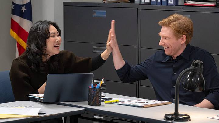 THE PAPER -- Episode 207 -- Pictured: (l-r) Ramona Young as Nicole, Domhnall Gleeson as Ned 