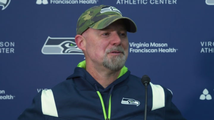 Seahawks offensive coordinator Ryan Grubb chats with reporters following the team's seventh OTA practice. Seahawks offensive coordinator Ryan Grubb chats with reporters following the team's seventh OTA practice.