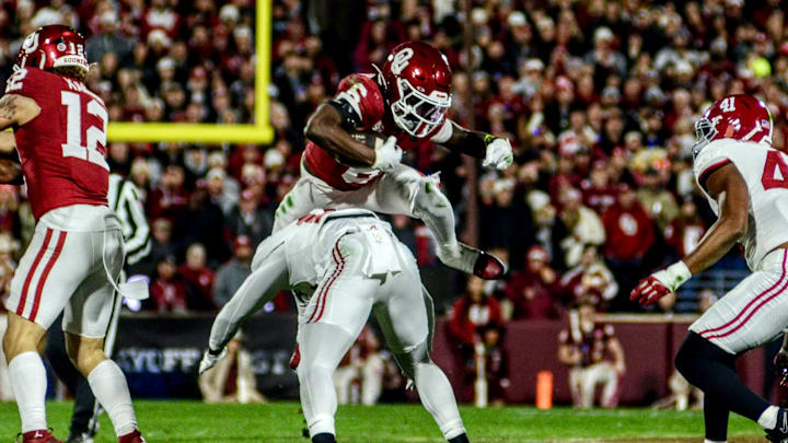 Oklahoma running back Tory Blaylock hurdles a defender against Alabama in the CFP. Oklahoma running back Tory Blaylock hurdles a defender against Alabama in the CFP.