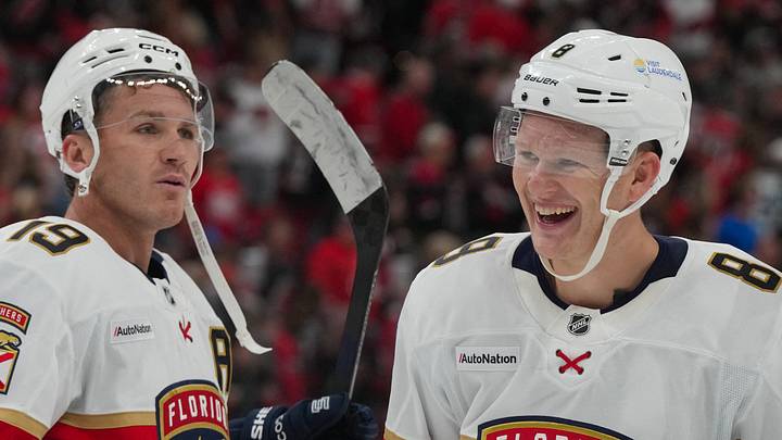 Sep 29, 2026; Raleigh, North Carolina, USA;  Florida Panthers left wing Matthew Tkachuk (19) and left wing Brady Tkachuk (8) celebrate after defeating the Carolina Hurricanes in overtime at Lenovo Center.  Mandatory Credit: James Guillory-Imagn Images