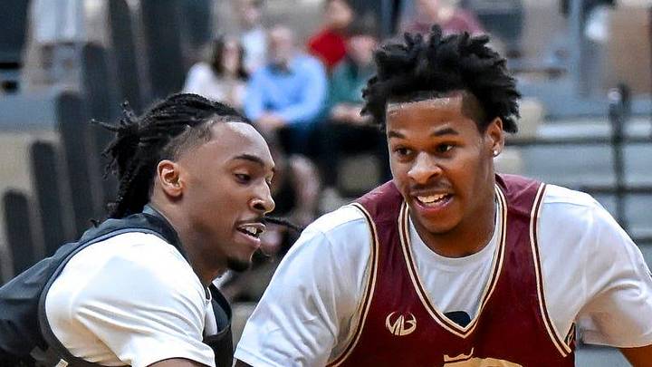 Team Motorcars and Michigan State's Carlos Medlock Jr., left, guards Team Faygo and MSU teammate Jasiah Jervis during the Moneyball Pro-Am on Tuesday, June 23, 2026, at Holt High School. Team Motorcars and Michigan State's Carlos Medlock Jr., left, guards Team Faygo and MSU teammate Jasiah Jervis during the Moneyball Pro-Am on Tuesday, June 23, 2026, at Holt High School.